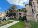 Two-story building with multiple apartments at 907 Charo Pkwy # 933, Davenport, FL 33897