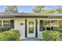 Front view of a charming ranch home at 715 Eastover Cir, Deland, FL 32724