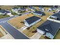 Aerial lot view of homes in a quiet cul-de-sac at 5731 Sw 90Th Ln, Ocala, FL 34476