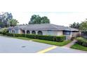 Exterior view of condo building showing multiple units at 518 Polaris Loop # 108, Casselberry, FL 32707