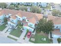 Townhome community with ample parking and green spaces at 1034 Chalcedony St, Kissimmee, FL 34744
