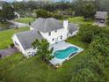 House with pool and large backyard. Features a two-car garage at 4155 Quail Wood Dr, St Cloud, FL 34772