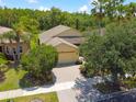 Aerial view of house and surrounding area at 196 Ventana Dr, Poinciana, FL 34759