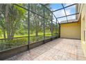 Screened patio with paver floor at 196 Ventana Dr, Poinciana, FL 34759