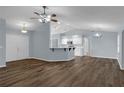 Spacious living room with an open layout and hardwood floors at 3570 Manor Loop, Lakeland, FL 33810