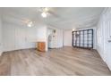 Spacious living area with laminate floors and built-in shelving at 1015 Ohio Ave, Saint Cloud, FL 34769
