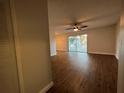 Bright and airy living room with wood-look floors at 3045 Aaron Burr Ave # 10, Winter Park, FL 32792