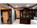 Entryway with a view into the living room and kitchen at 2440 Summerfield Way, Kissimmee, FL 34741