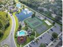 Aerial view of community amenities including tennis and basketball courts at 2280 San Vital Dr # 105, Kissimmee, FL 34741