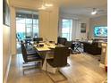 Modern dining room with table and chairs at 4295 Paragraph Dr, Kissimmee, FL 34746