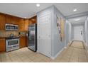 Well-equipped kitchen featuring stainless steel appliances at 7662 Whisper Way # 402, Reunion, FL 34747