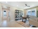 Bright home office with built-in shelving and desk at 4072 Bannock Ave, Tavares, FL 32778