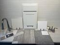 Modern kitchen with wood cabinets, quartz countertops, and island at 4072 Bannock Ave, Tavares, FL 32778