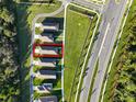 Aerial view showing a house's location in a neighborhood at 6883 Botanic Blvd, Harmony, FL 34773