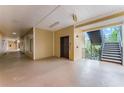 Building hallway with elevator and stairs access at 9051 Treasure Trove Ln # 307, Kissimmee, FL 34747