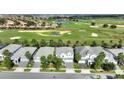 Houses in a community near a golf course at 1423 Bunker Dr, Davenport, FL 33896