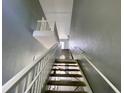 Interior view of a staircase leading to upper levels at 660 Celebration Ave # 260, Kissimmee, FL 34747