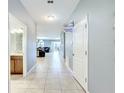 Bright hallway with access to other rooms at 9158 Wedge Dr, Davenport, FL 33896