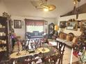 Spacious living room showcasing elegant furniture and a decorative ceiling fan at 1053 Hemingway Dr, Deltona, FL 32725