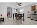 Eat in kitchen with stainless steel appliances and wood cabinetry at 136 Alhambra Ave, Altamonte Springs, FL 32714