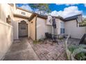 Private patio with table and chairs at 1423 Farrindon Cir # 1423, Lake Mary, FL 32746
