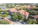 Aerial view showing condo building location and surrounding area at 6141 Metrowest Blvd # 307, Orlando, FL 32835