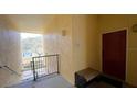 Hallway with red door to unit 3304 and a view at 1150 Lake Shadow Cir # 3304, Maitland, FL 32751