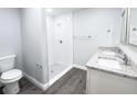 Bathroom with a walk-in shower and granite countertops at 1030 Darlington Ct, Kissimmee, FL 34758