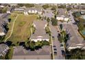High-angle view of apartment building and surrounding community at 2302 Butterfly Palm Way # 303, Kissimmee, FL 34747