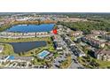 Townhome community near a lake and pool at 355 Highcrest Rd, Davenport, FL 33896