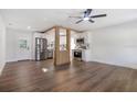 Modern kitchen with stainless steel appliances and wood flooring at 527 Sunrise Dr, Orlando, FL 32803