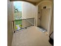 Private balcony with scenic view and entry door at 2778 Almaton Loop # 303, Kissimmee, FL 34747