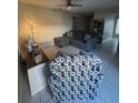 Bright and spacious living room with tile flooring and comfortable seating at 453 Hunter Circle, Kissimmee, FL 34758