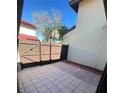Private patio with tile flooring, ideal for outdoor relaxation at 453 Hunter Circle, Kissimmee, FL 34758