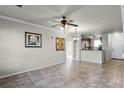 Open floor plan living room, kitchen, and dining area at 902 Charo Pkwy # 636, Davenport, FL 33897