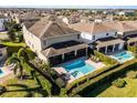 An aerial view showcasing the home's private pool and backyard oasis at 7639 Wilmington Loop, Kissimmee, FL 34747