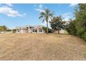 Ranch-style home with mature landscaping and a spacious lot at 1960 Jan Lan Blvd, Saint Cloud, FL 34772