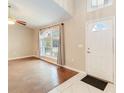 Bright and airy living room with hardwood floors and large window at 1960 Jan Lan Blvd, St Cloud, FL 34772