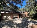 Two-car attached garage with driveway at 3800 Lavender Way, Casselberry, FL 32707