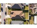 Top-down aerial view of a single-Gathering house and surrounding neighborhood at 4563 Orchard Grove Rd, Saint Cloud, FL 34772