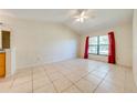 Bright bedroom with tile flooring and ceiling fan at 1416 Wood Lake Cir, St Cloud, FL 34772