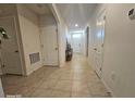 Bright and spacious entryway with tile flooring at 2672 Harmonia Hammock Rd, Harmony, FL 34773
