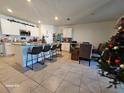 Modern kitchen with island, stainless steel appliances, and granite countertops at 2672 Harmonia Hammock Rd, Harmony, FL 34773