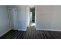 Bright hallway with light gray walls and wood-look flooring at 1043 N New York Ave, Lakeland, FL 33805