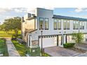 Townhome with attached garage and nicely landscaped front yard at 1800 Houston St, Kissimmee, FL 34743