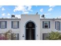 An aerial perspective showcasing the building's exterior and entryway at 1006 Plantation Dr # F12, Kissimmee, FL 34741
