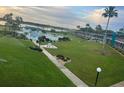 An aerial view of the condo complex showcasing its landscaping and pool at 1600 W Lake Parker Dr # B23, Lakeland, FL 33805