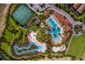 Community features a large pool, tennis courts, and expansive green spaces at 4191 Oaktree Drive, Davenport, FL 33837