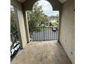Balcony overlooking parking lot and lake at 4728 Walden Cir # 37, Orlando, FL 32811