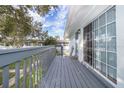 Private deck with grey railings, offering access from the condo at 4860 Conway Rd # 56, Orlando, FL 32812